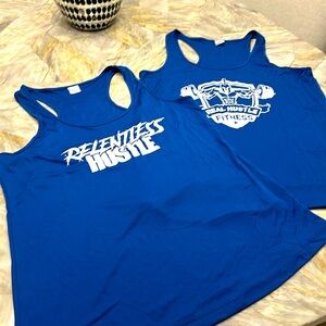 Get 2 Real Hustle Women’s Workout Tank Tops in a size Large NWOT